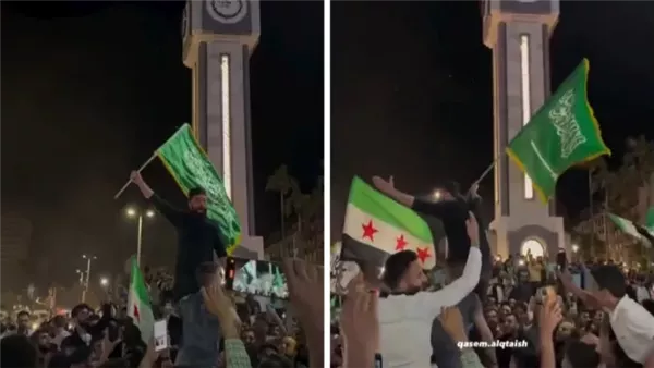 رفع علم السعودية في حمص